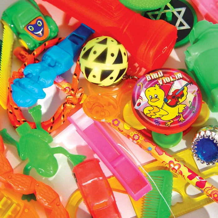 Close-up of assorted colourful plastic toys from the Sherman Specialty treasure chest toy mix