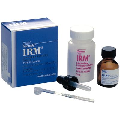 IRM Intermediate Restorative Material standard package in the previous blue Caulk box, with powder, liquid, scoop and dropper