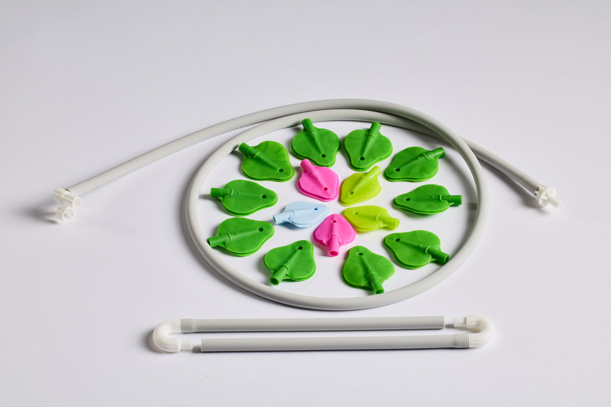 ReLeaf hose set with leaves laid out