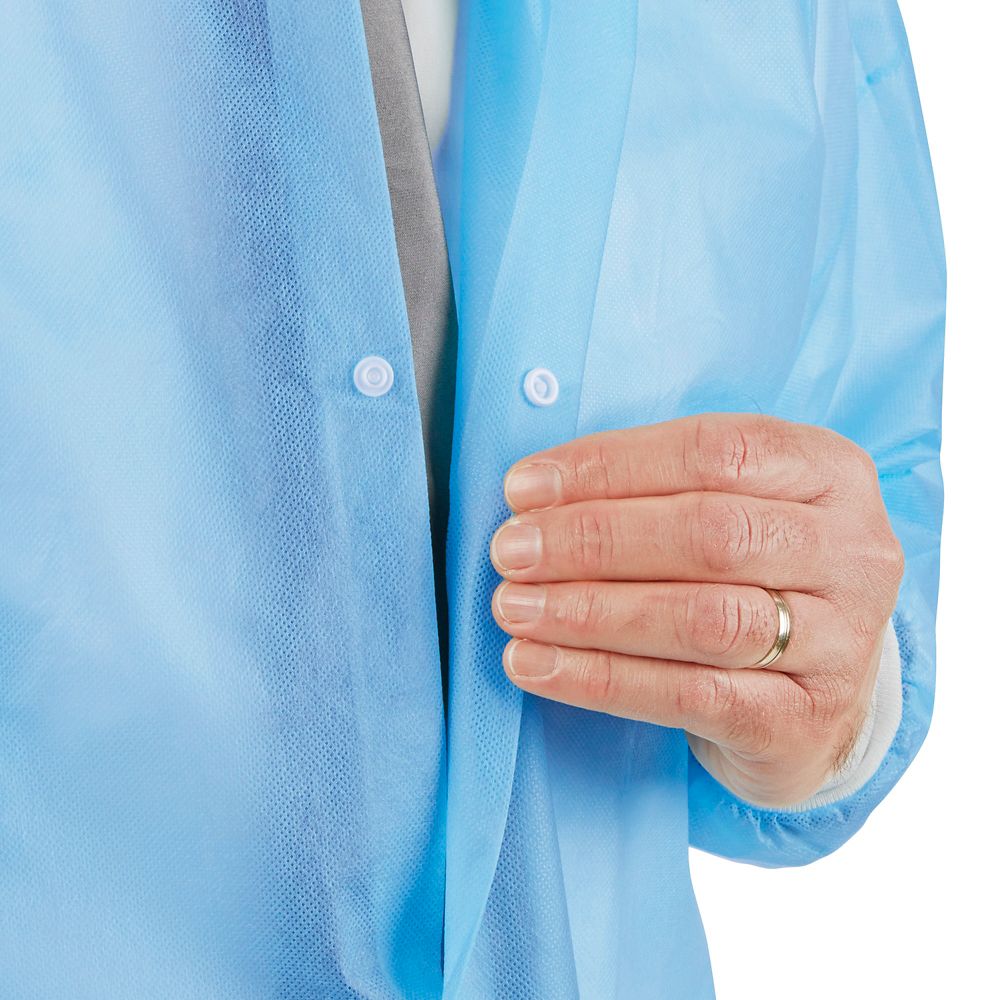 Close-up of the snap front closure on the Uline blue knit cuff lab coat