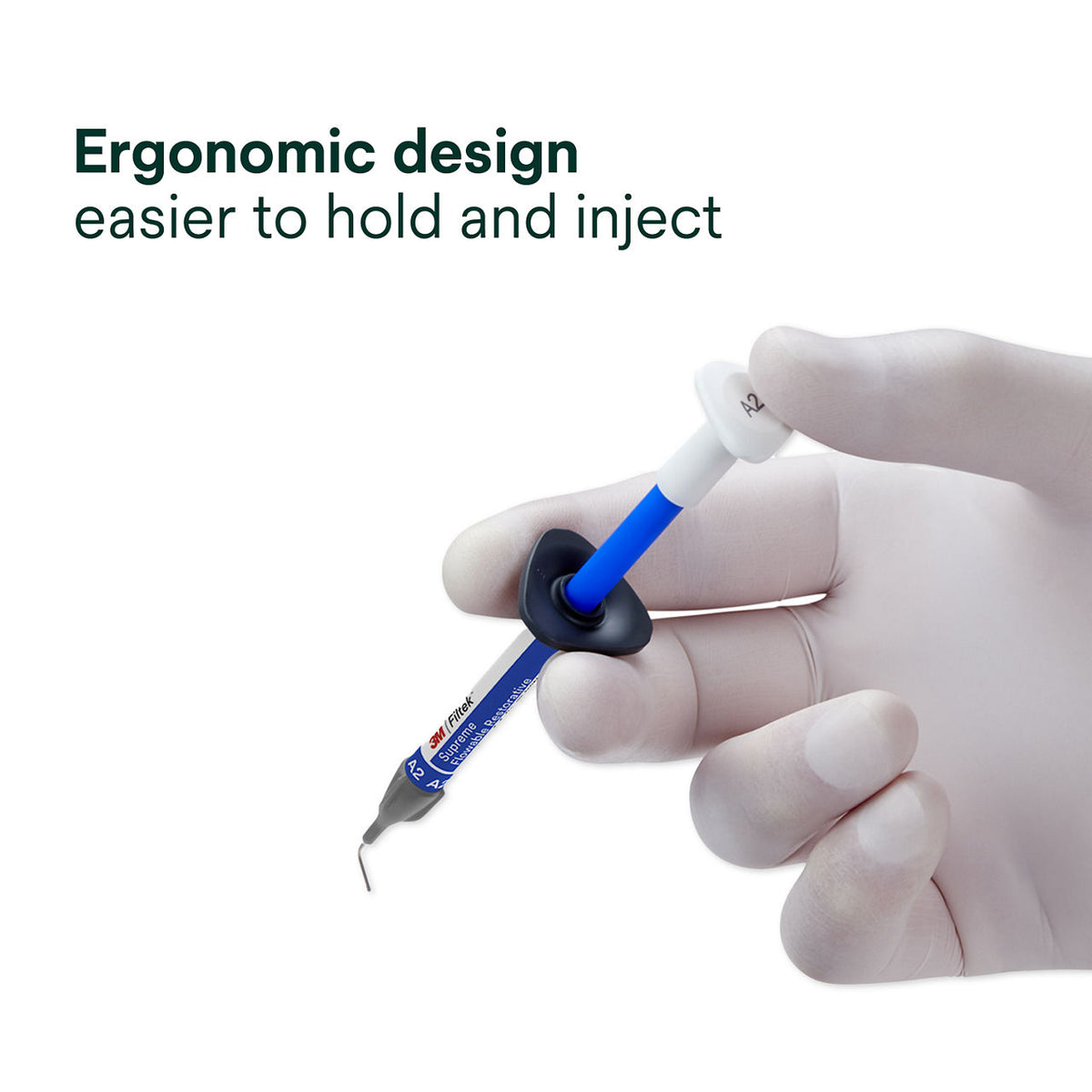 Filtek Supreme Flowable syringe held in the hand