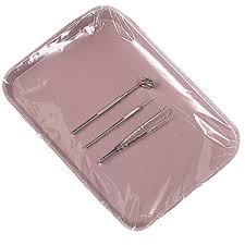 Clear plastic sleeve covering a dental instrument tray (low resolution, 225 px)