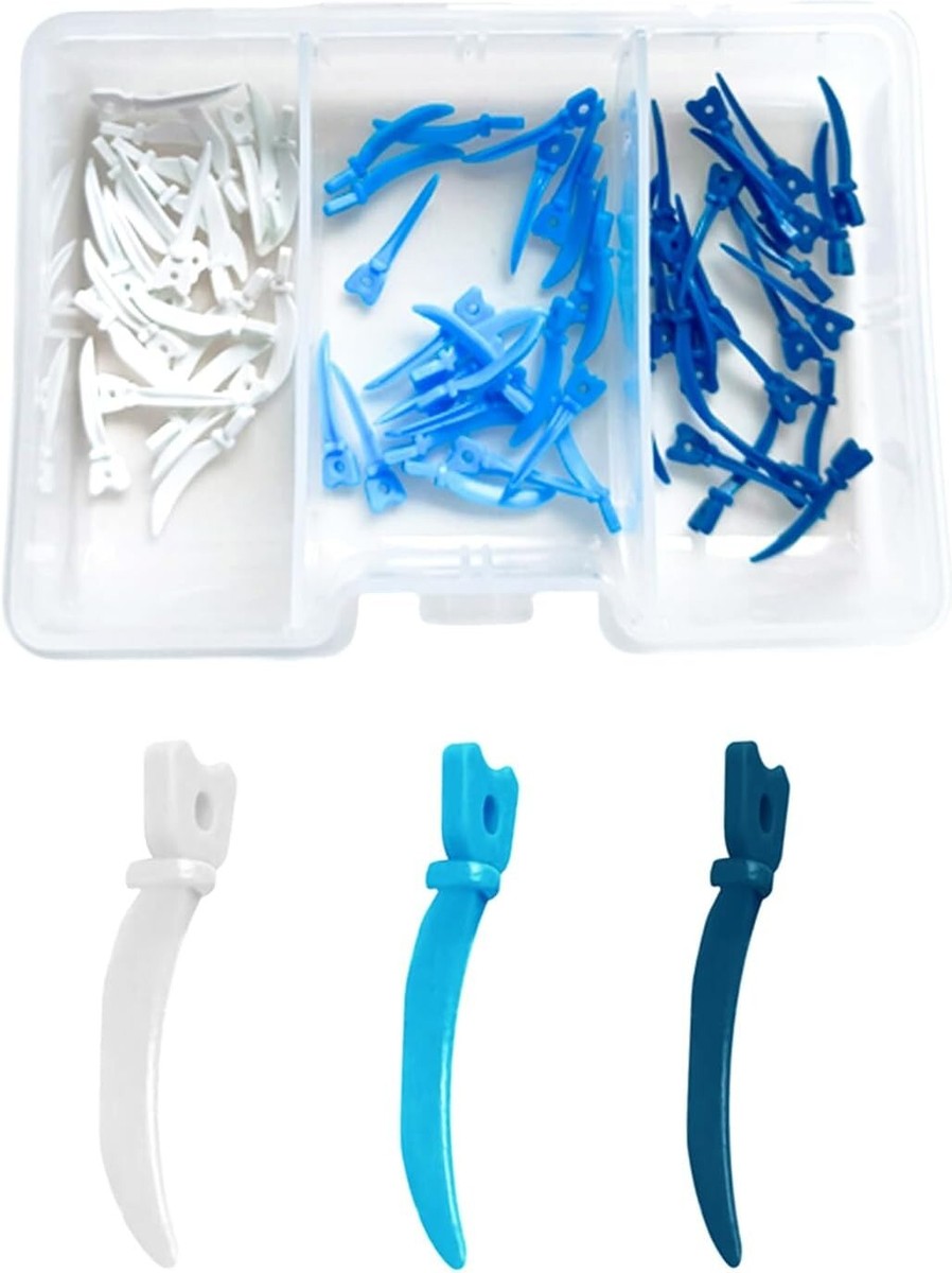 Plastic wedges with holes in a case: white, blue and dark blue sizes